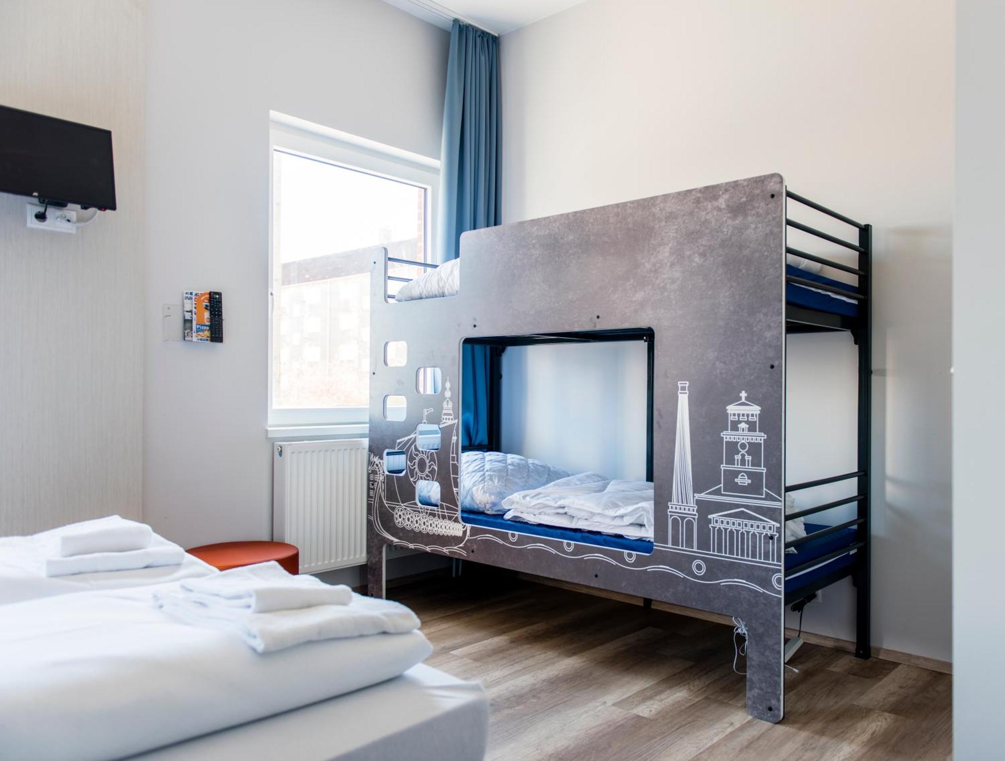 Posto Letto in Dormitorio con 4 Letti